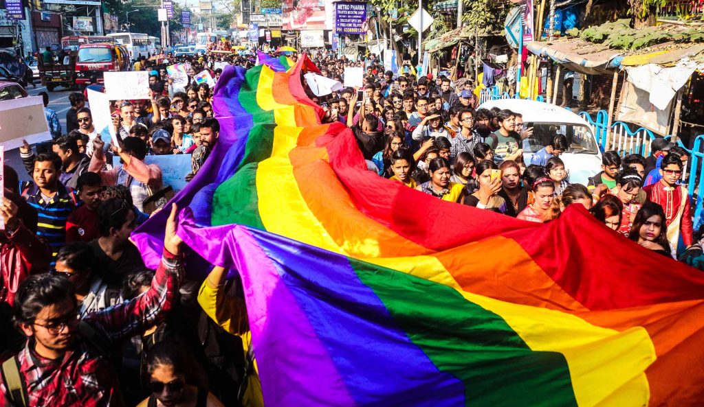 Thousands of LGBTQ and allies marched Kolkata's streets carrying a giant rainbow flag.