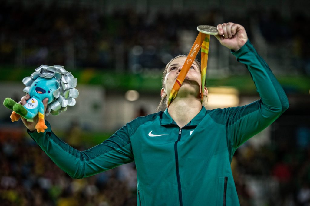 Alana Maldonado holds up the medal after winning the judoka competition